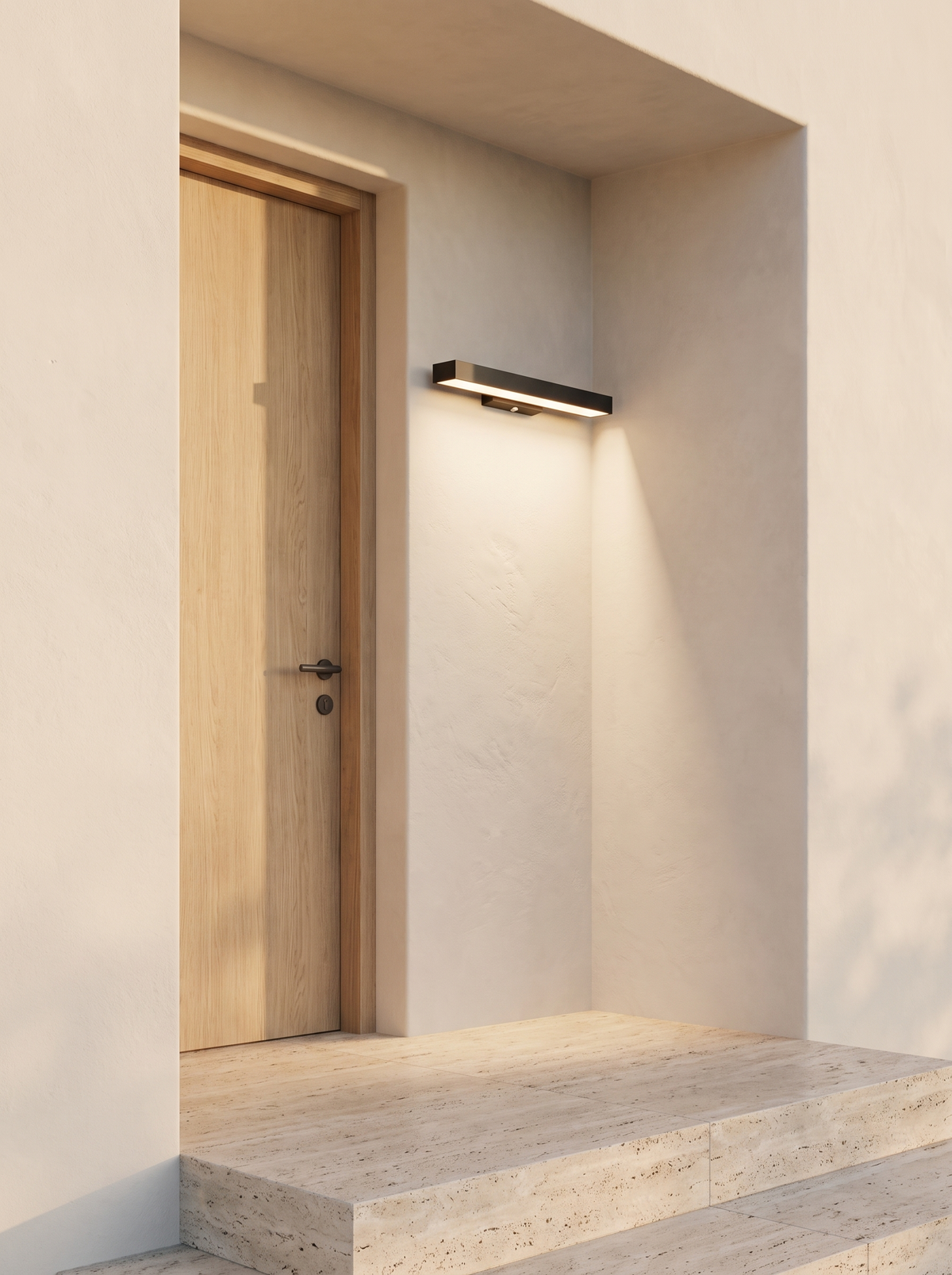 Marquel wall light throwing its beam down onto the step below the door