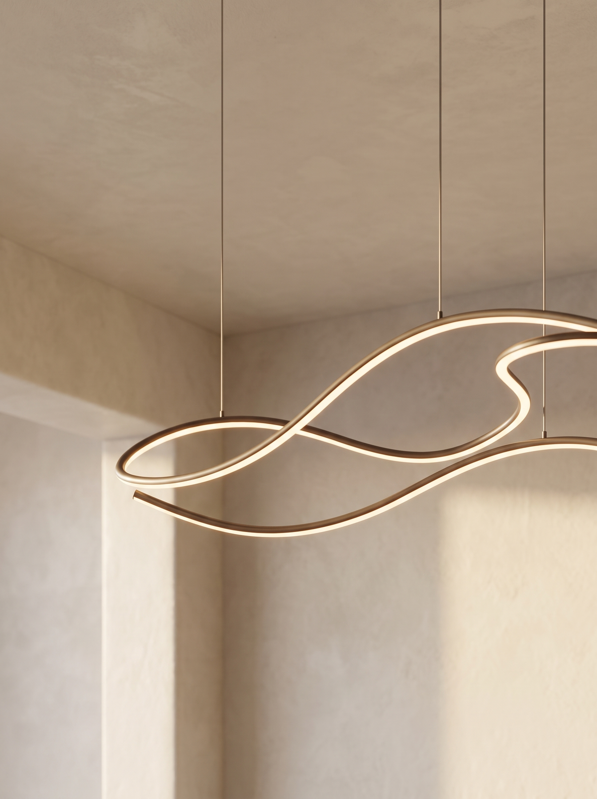 Ondelle pendant seen from below as one unbroken undulating curve