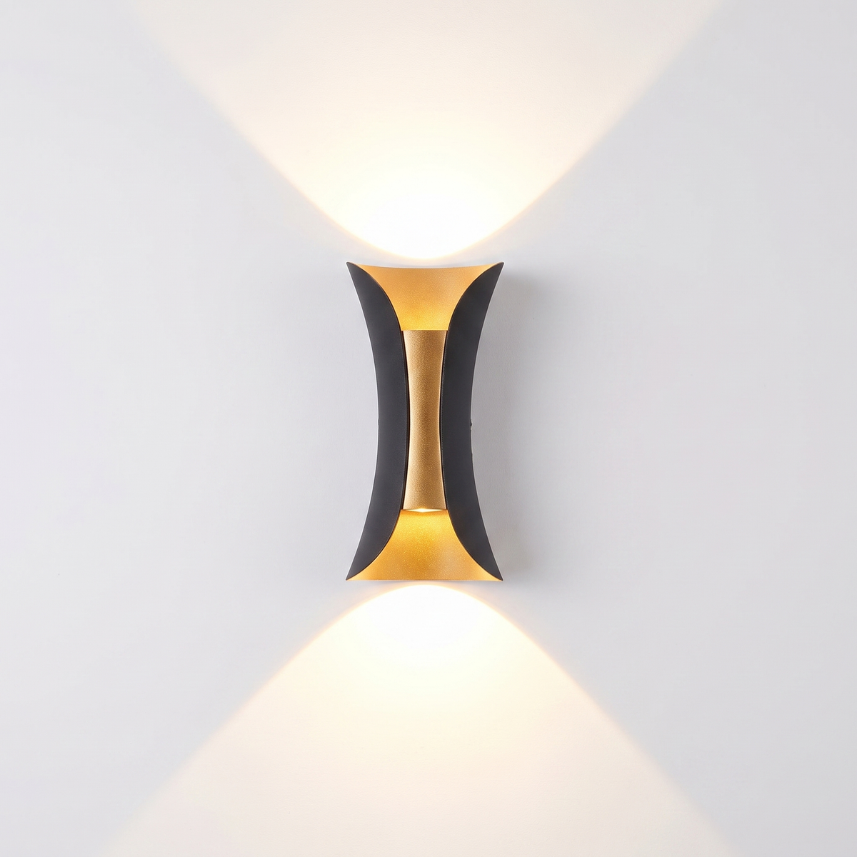 Arcelle curved up and down wall sconce on a white background