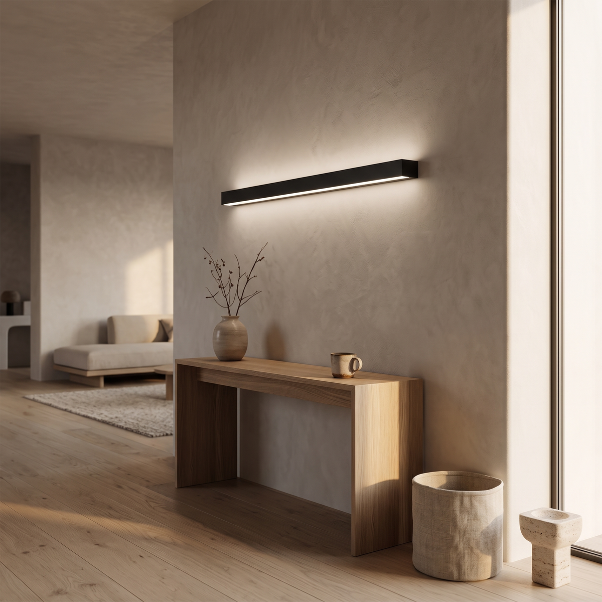 Lumira linear wall light above a white oak hallway console