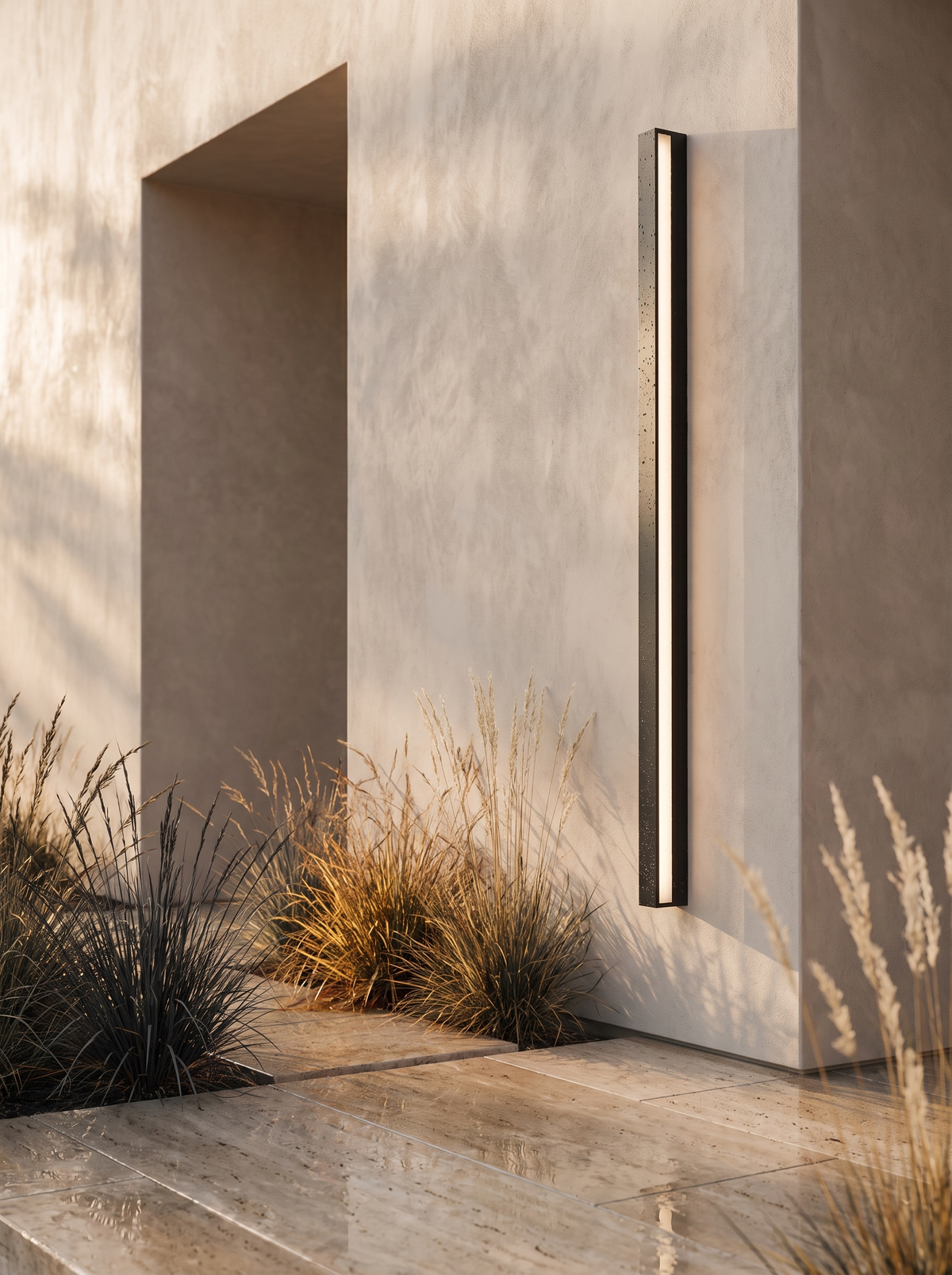 Lumira linear wall light with rain beaded on its sealed housing
